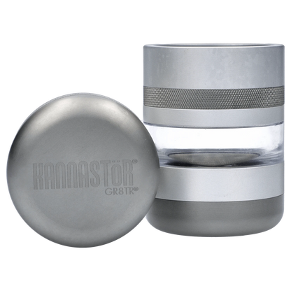 Close-up of the matte silver GR8TR Jar Body Grinder 2.2", showcasing its cylindrical shape and metallic finish.