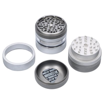 A top-down view of the matte silver GR8TR Jar Body Grinder 2.2", showcasing its cylindrical shape and multi-part construction.