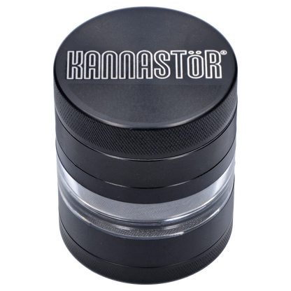 A close-up, angled view of the black Kannastör Jar Body Grinder 2.2, showcasing its cylindrical shape and metallic finish.