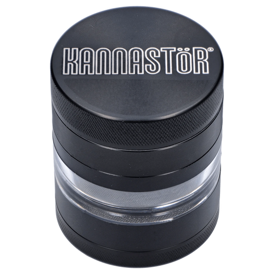 A close-up, angled view of the black Kannastör Jar Body Grinder 2.2, showcasing its cylindrical shape and metallic finish.