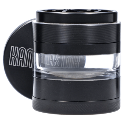 A close-up, angled view of the black Kannastör Jar Body Grinder 2.2", showcasing its cylindrical form and metallic finish.