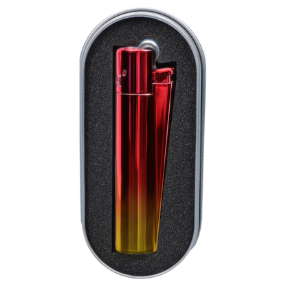 Close-up top-down view of the sunset-hued Clipper Metal Lighter - Sunset Gradient nestled upright in black foam within a rounded metal case