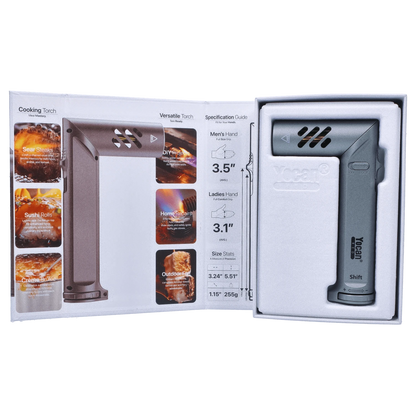 A slightly angled studio shot of the Yocan Shift Torch in space grey, presented in its packaging with graphics and text.