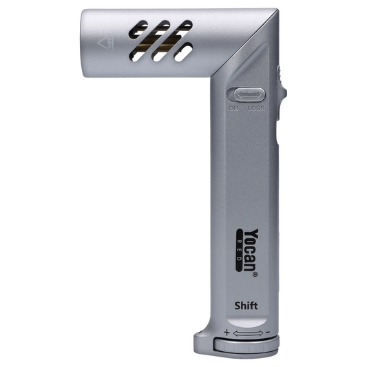 A close-up, angled view of the silver Yocan Shift Torch, displaying its button controls and sleek metallic finish.