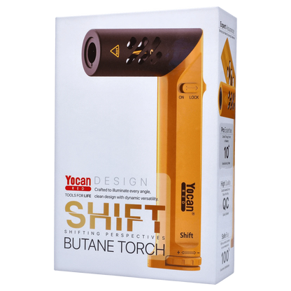 A close-up, angled view of the yellow Yocan Shift Torch, displaying text details on its packaging and quality assurance labels.