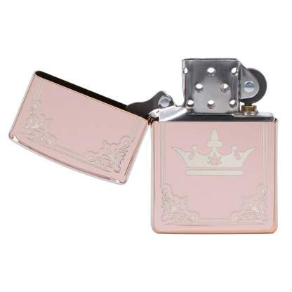 Close-up, front-angle view of the open Queen of Bud Zippo Rose Quartz Filigree lighter showing its rose-quartz panels, silver crown motif, and engraved filigree details.