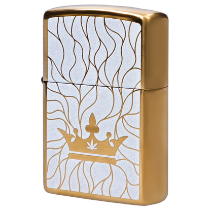 Angled close-up of the Queen of Bud Zippo Clear Quartz Mosaic showing gold edges and a white panel with flowing linework and crown motif