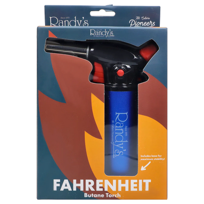 Close-up front view of Randy's Fahrenheit Butane Torch - Blue in its packaging, showing the black nozzle and red controls above the visible blue torch body.