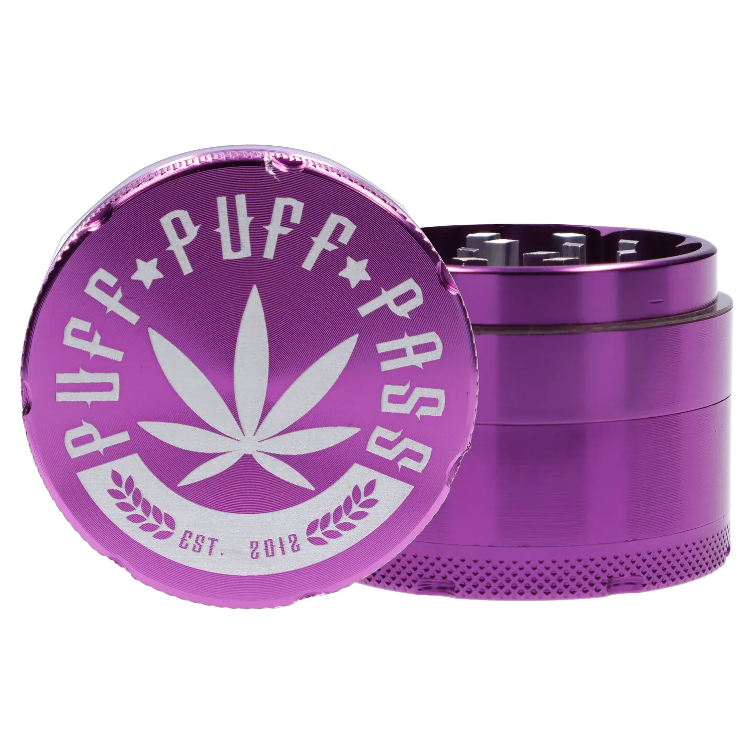 Close-up front view of the purple Puff Puff Pass Aluminum Grinder 4pc -Purple-50mm showing the engraved leaf logo on the lid and the textured grinder body.