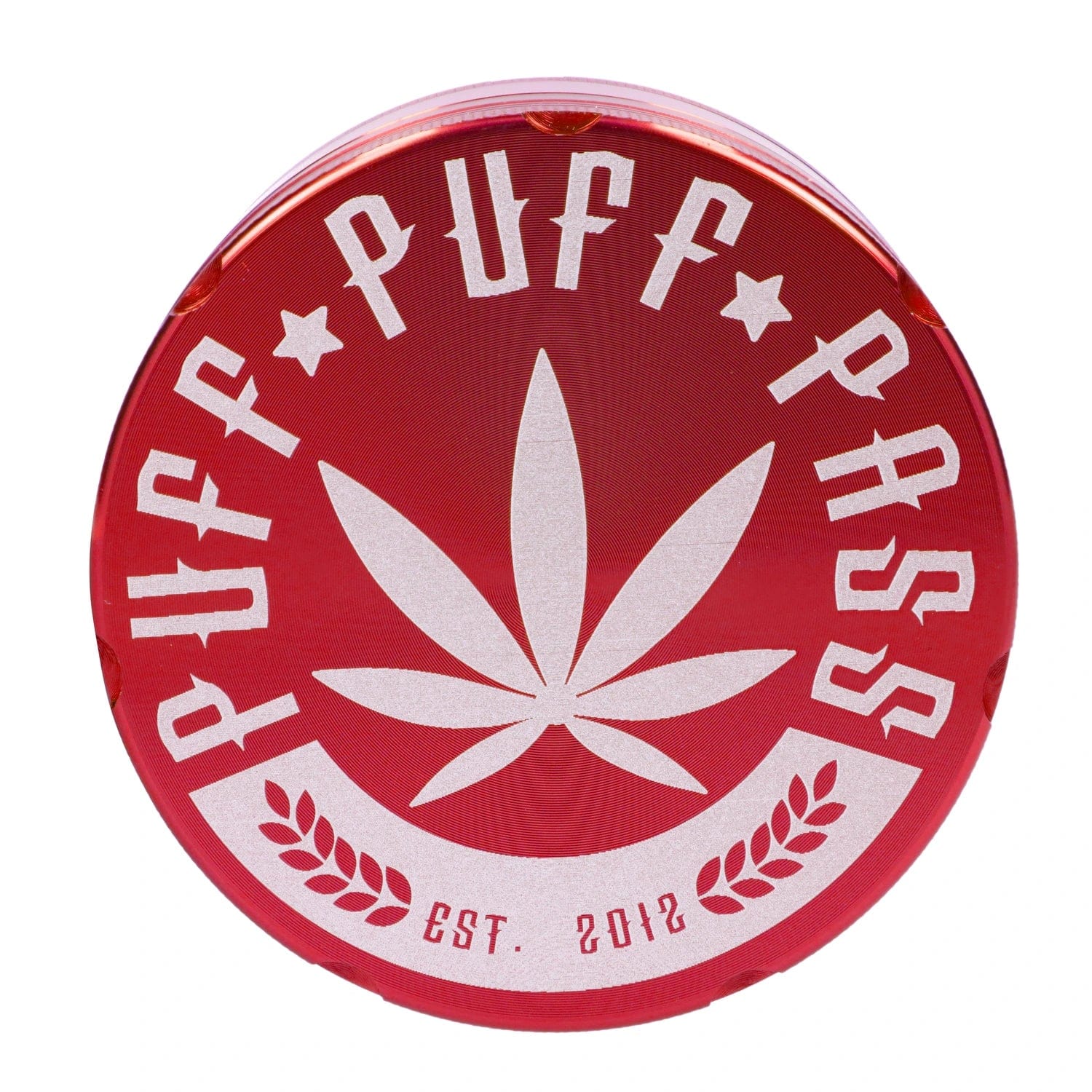 Front view of the red 62mm Puff Puff Pass Aluminum 4pc Grinder, showing a circular design with a floral emblem.