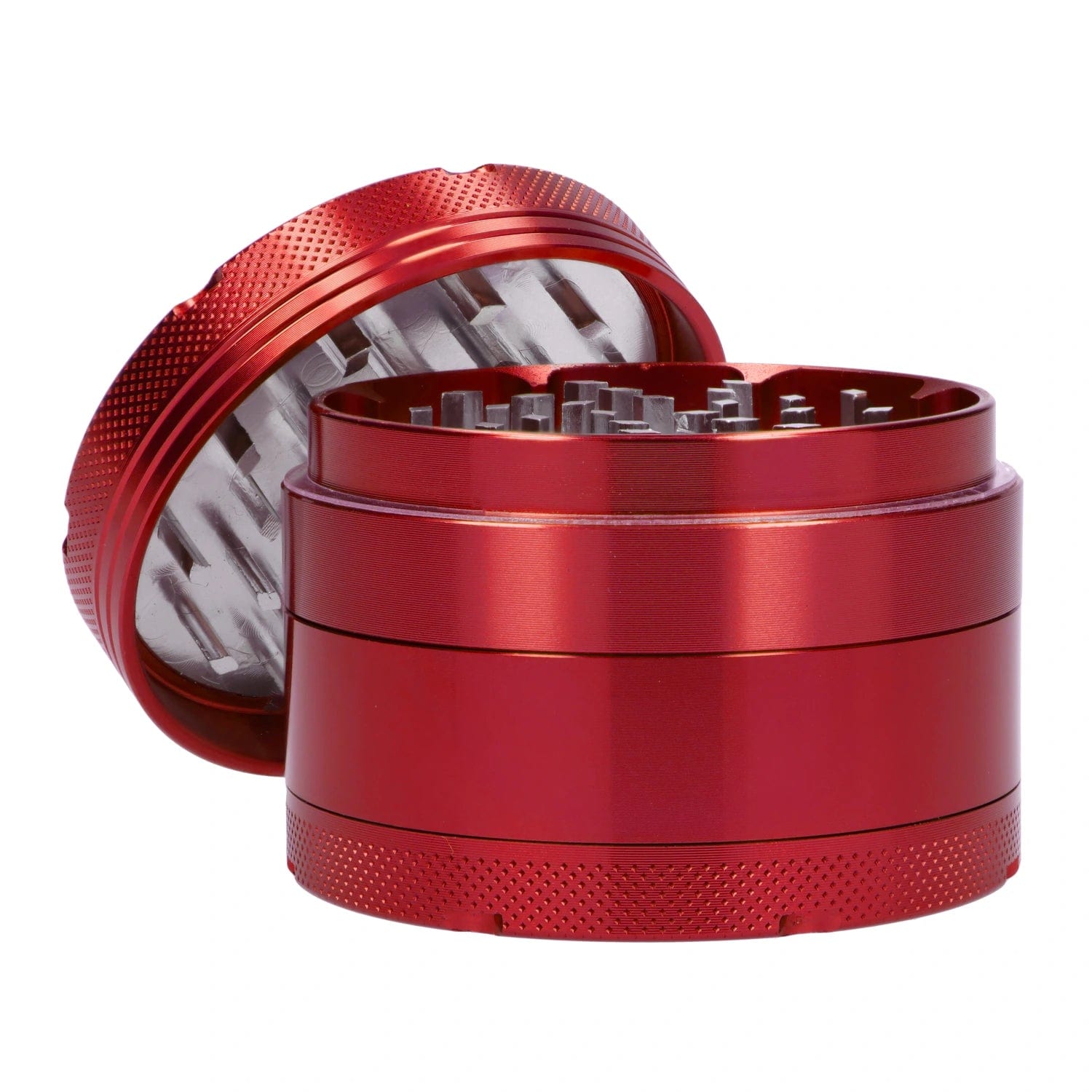 A close-up, angled view of the open Puff Puff Pass Aluminum 4pc Grinder in red, showcasing its multi-tiered construction.