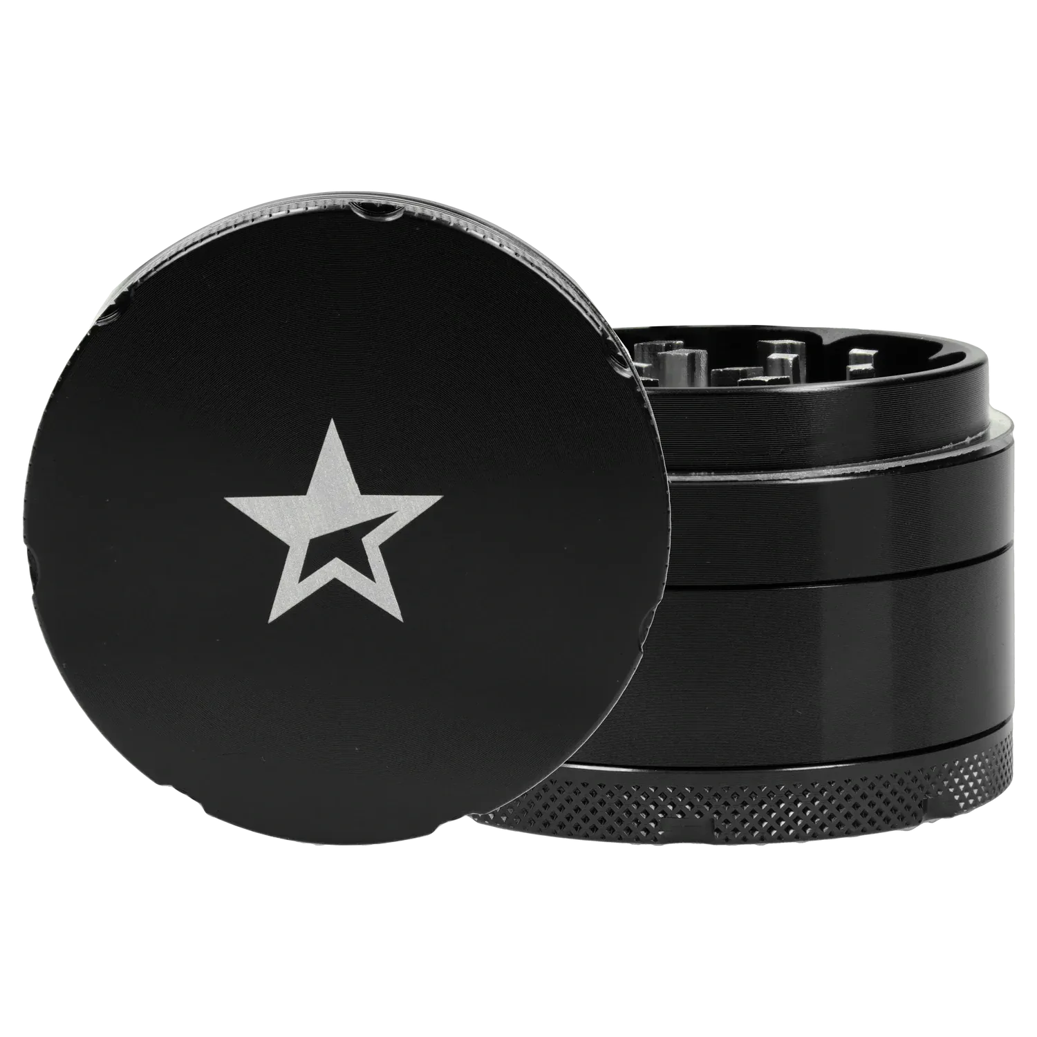 Close-up three-quarter view of the Famous X 4 pc Grinder -Black - 50mm showing the black top with a silver star logo and textured knurled base.