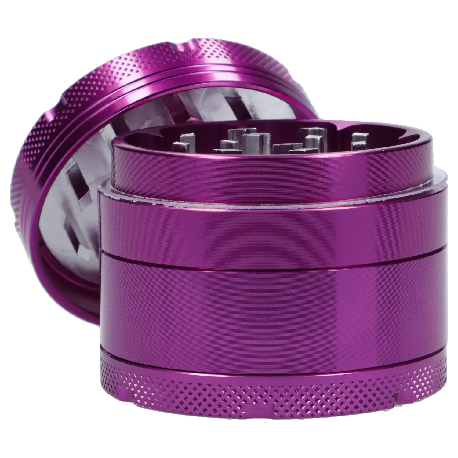 Close-up angled view of the purple Famous X 4 pc Grinder -Purple - 50mm showing its textured top, exposed internal teeth, and stacked cylindrical chambers.