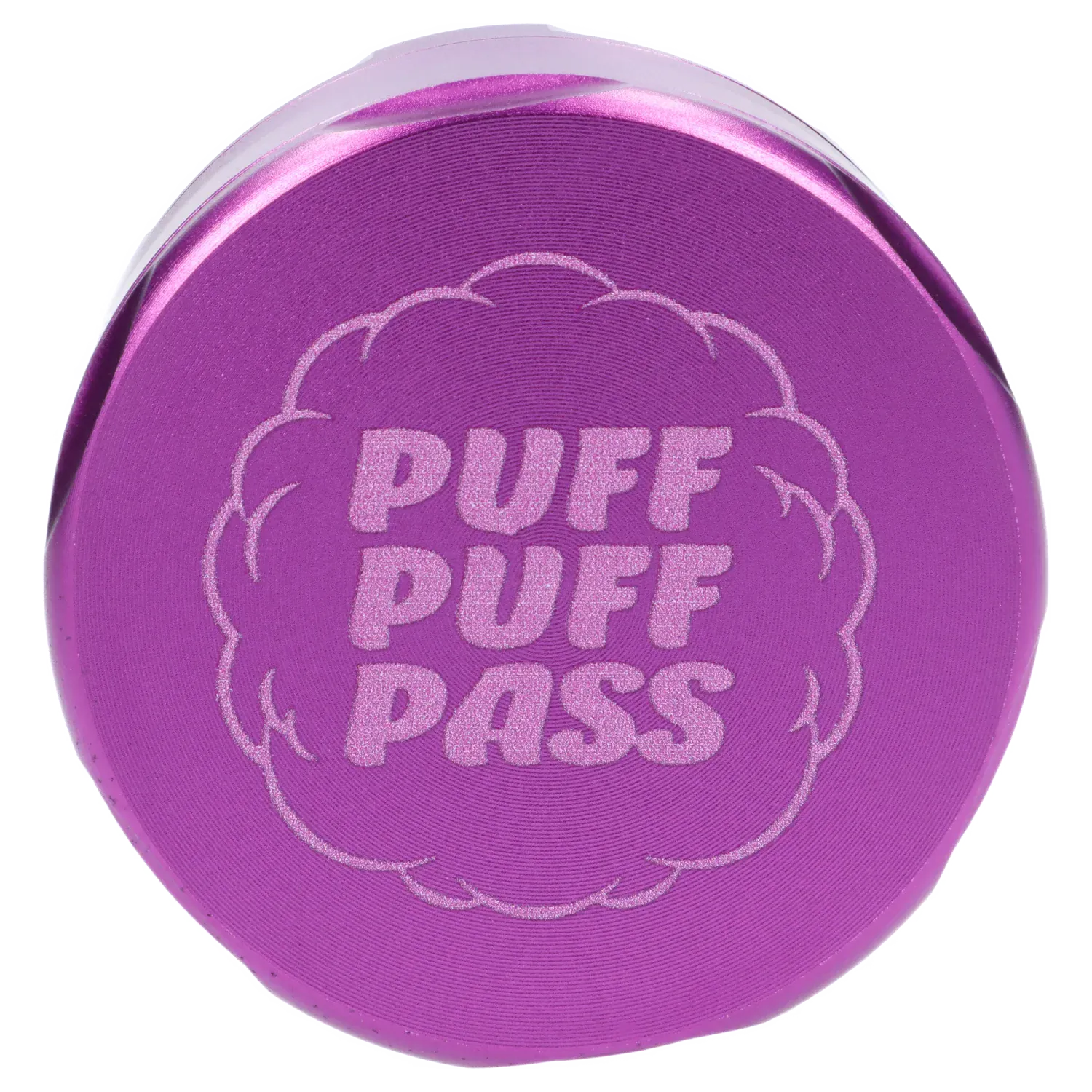 Top-down close-up of the purple Puff Puff Pass Strains Granddaddy Grinder-Purple lid showing raised concentric rings and glittery logo text.