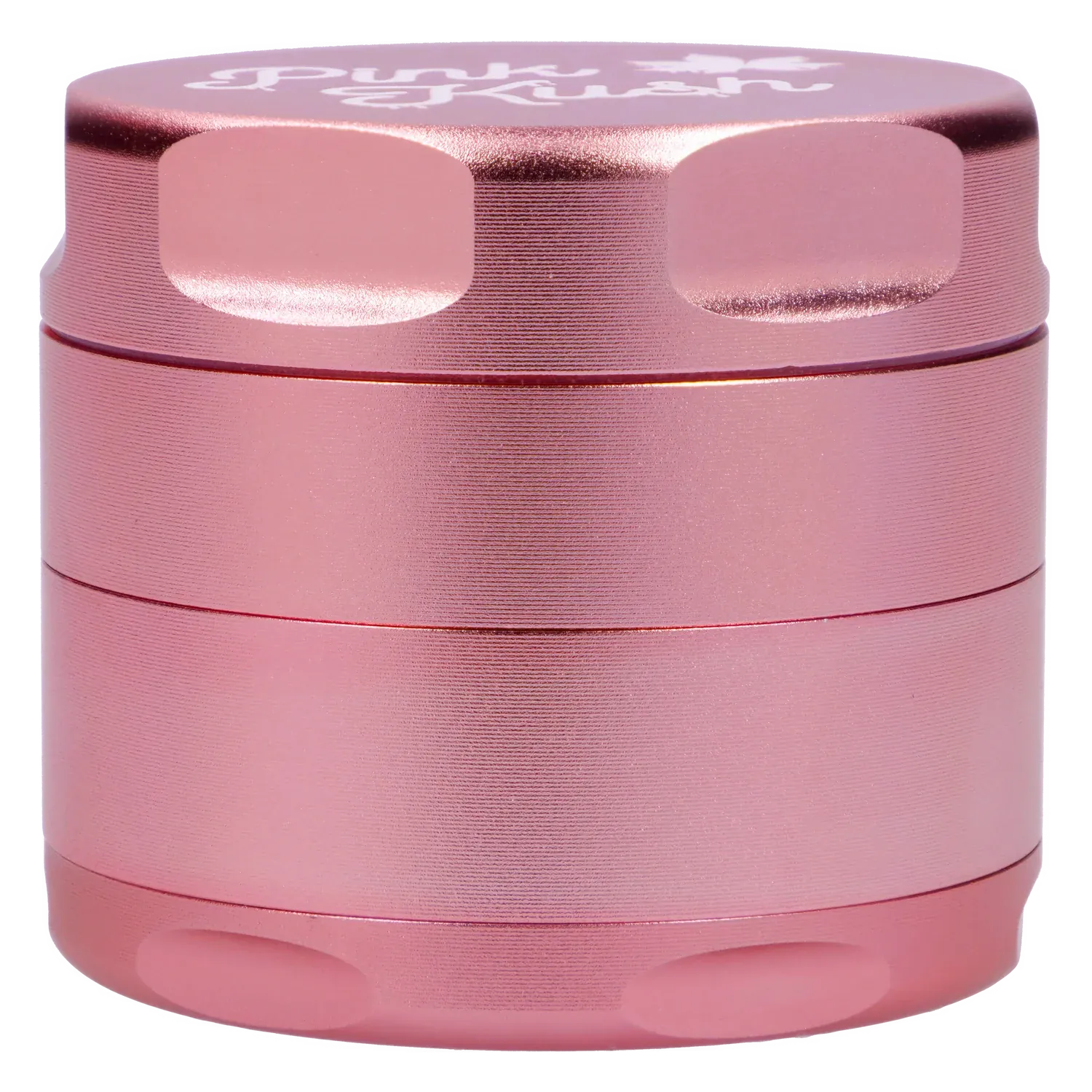 Close-up front view of the metallic light pink Puff Puff Pass Strains Pink Kush Grinder-Light Pink showing textured, stacked cylindrical sections and beveled grip notches.
