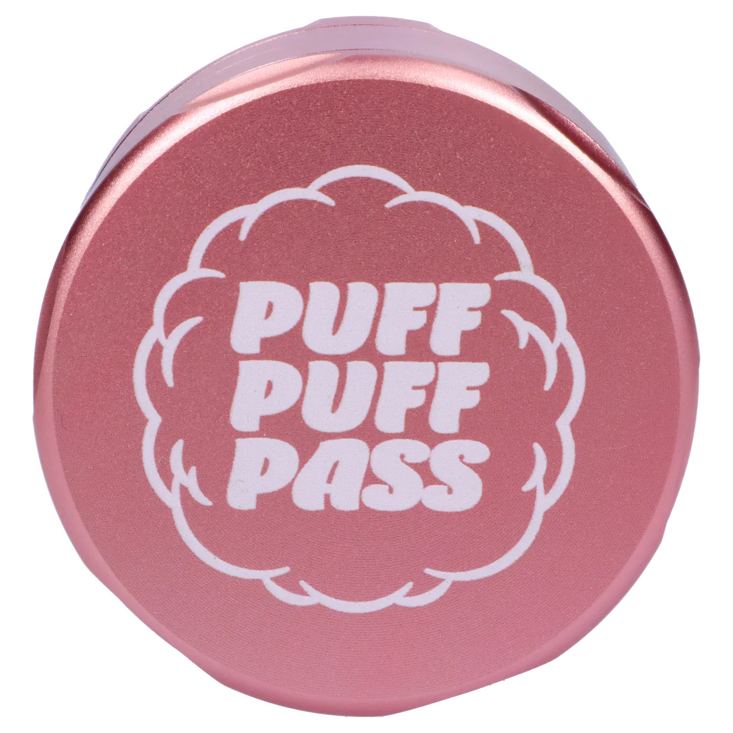 Top-down close-up of the light pink Puff Puff Pass Strains Pink Kush Grinder-Light Pink lid showing bold white "PUFF PUFF PASS" text inside a cloud motif.