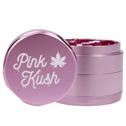 Front view of the Puff Puff Pass Strains Pink Kush Grinder in light pink, showcasing its multi-tiered, cylindrical design.