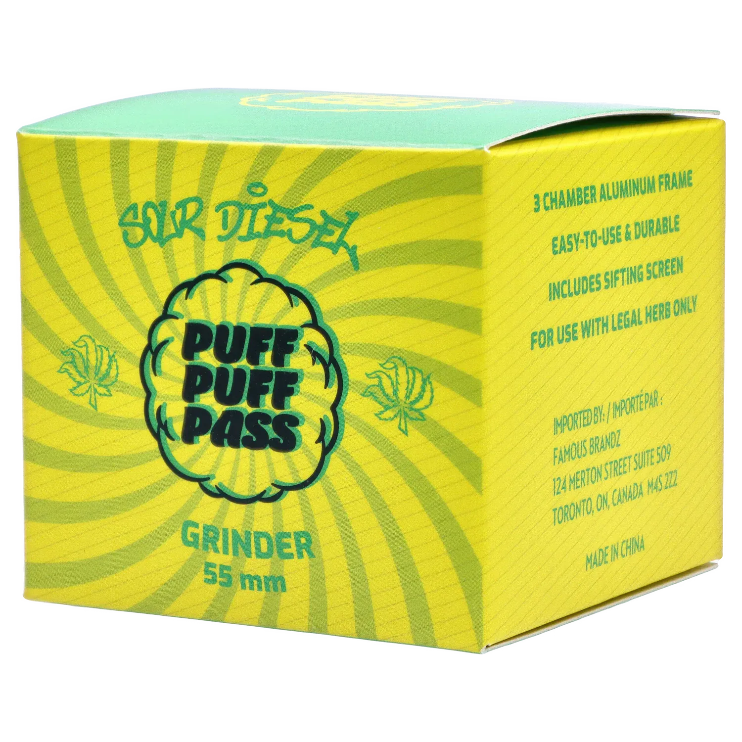 Angled close-up of the green Puff Puff Pass Strains Sour Diesel Grinder-Green box with sunburst graphics and bold logo on a white background