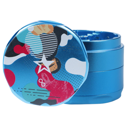 Close-up front view of the Famous Design Aquarius Aluminum 4 pc Grinder - Aqua showing its colorful patterned lid and metallic blue body