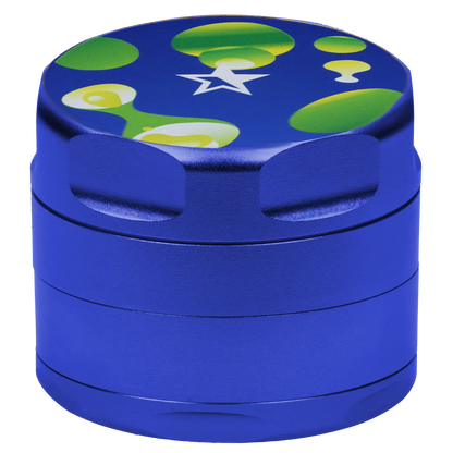 Close-up top-front view of the blue Famous Design Privilege Aluminum 4pc Grinder - Blue showing its textured metal sides and a colorful green and yellow bubble star graphic on the lid