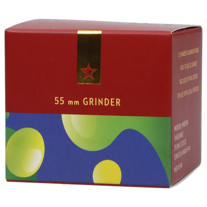Close-up front view of the Famous Design Privilege Aluminum 4pc Grinder - Blue box showing a red top with gold star emblem and colorful abstract blue and green patterned lower panel