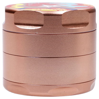 Close-up front view of the Famous Design Papaya Aluminum 4pc Grinder - Rose Gold showing textured concentric ridges and finger notches on the metallic lid.