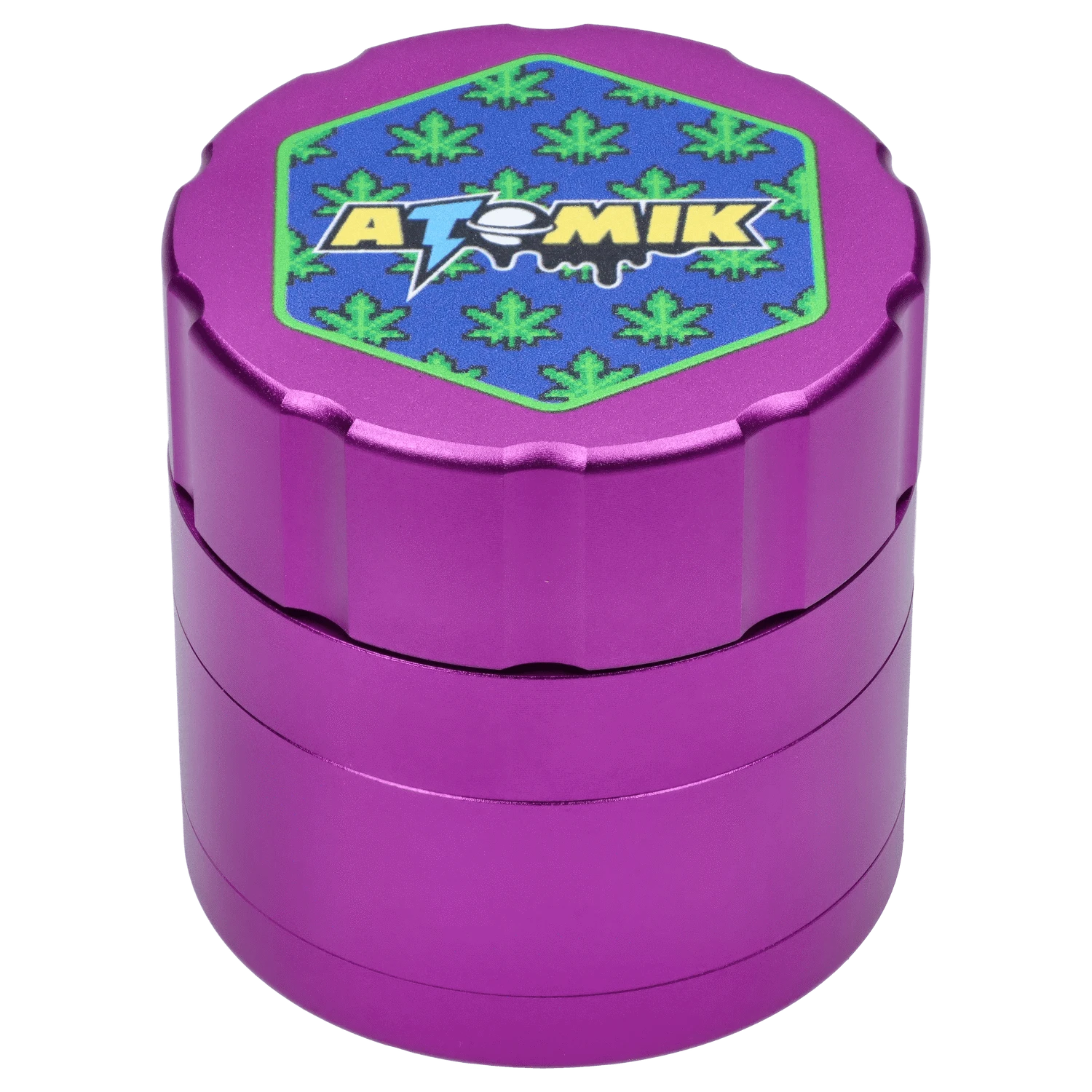 Front view of the Atomik Pixelated 55 mm 3-Stage Grinder, a purple metal grinder with a textured surface.
