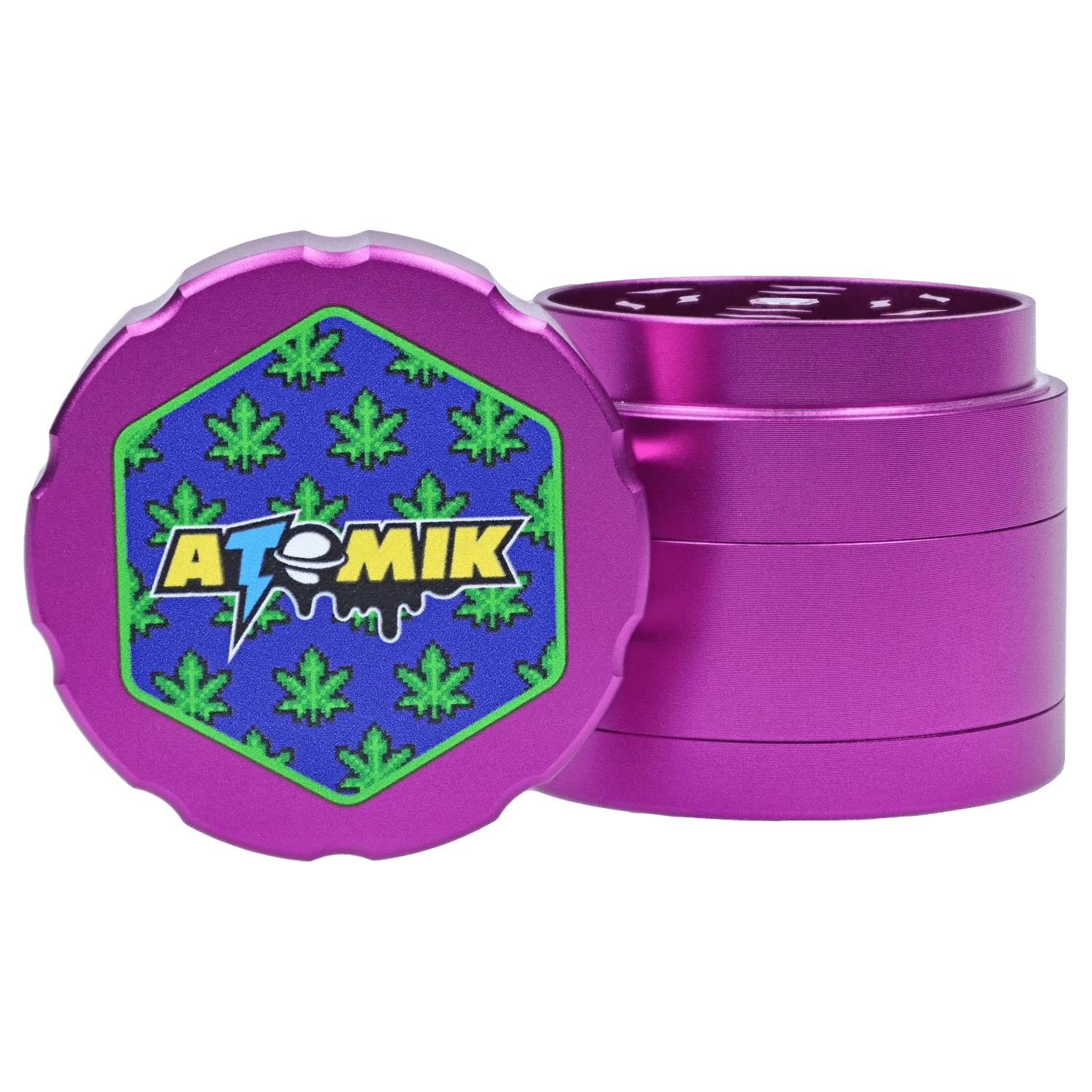 A close-up, angled view of the Atomik Pixelated 55 mm 3-Stage Grinder, showcasing its purple, textured design.