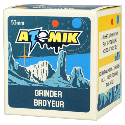 Front view of the Atomik Pixelated 55 mm 3-Stage Grinder, showcasing its colorful, pixelated design and tiered construction.