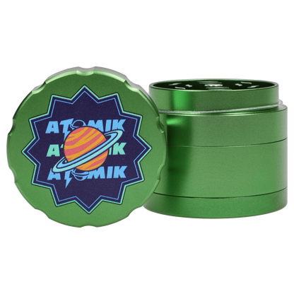 A close-up, angled view of the Atomik Ringed 55 mm 3-Stage Grinder, showcasing its circular, tiered design.