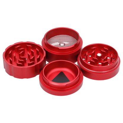 A top-down view of the disassembled Atomik Spaced 55 mm 3-Stage Grinder, showing its metallic components and multi-tiered design.