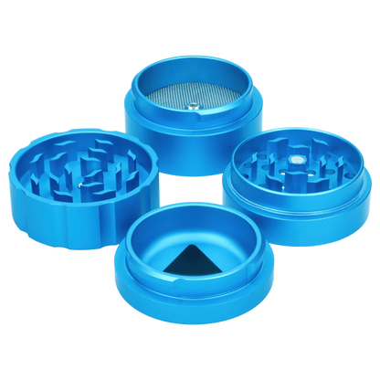 Overhead view of the Atomik Cheesed 55 mm 3-Stage Grinder, disassembled to showcase its multi-tiered, metallic finish.