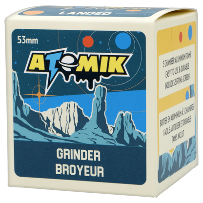 Front view of the Atomik Landed 55 mm 3-Stage Grinder, featuring a metallic finish and detailed branding on a dark background.