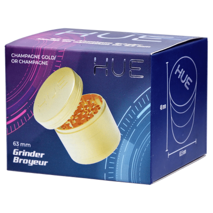 Front view of the Hue 3-Stage Grinder in champagne gold, showcasing its multi-tiered design and metallic finish.