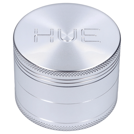 A front view of the Hue 3-Stage Grinder in chrome, showcasing its cylindrical, multi-tiered design.