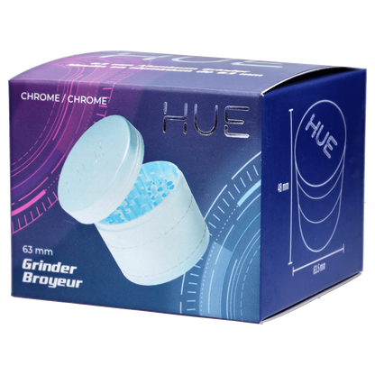 Front view of the Hue 3-Stage Grinder in chrome, showcasing its multi-tiered design against a blurred, colorful background.