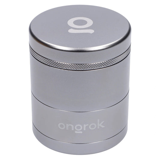 Front view of the Ongrok Toothless 5 Piece Grinder in gun metal, showing a cylindrical, multi-part design.