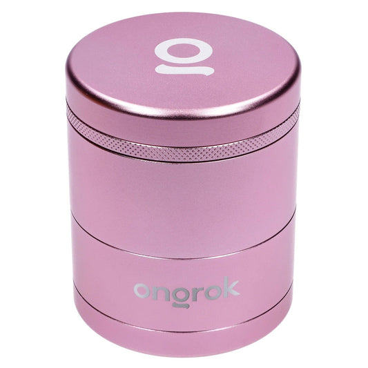 Front view of the rose gold Ongrok Toothless 5 Piece Grinder, showcasing its cylindrical shape and metallic finish.