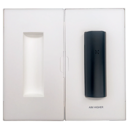 Top-down view of the Onyx PAX Flow Dry Herb Vaporizer – Onyx nestled in white packaging beside an empty molded compartment.