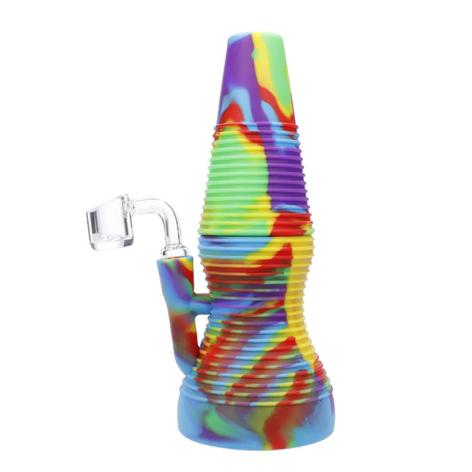 A vibrant, angled view of the Valiant Silicone Dab Rig - Rainbow, showcasing its colorful, textured design and joint connection.