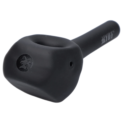 A close-up, angled view of the RYOT - Stand Up Spoon, showing its dark, curved shape against a plain white background.