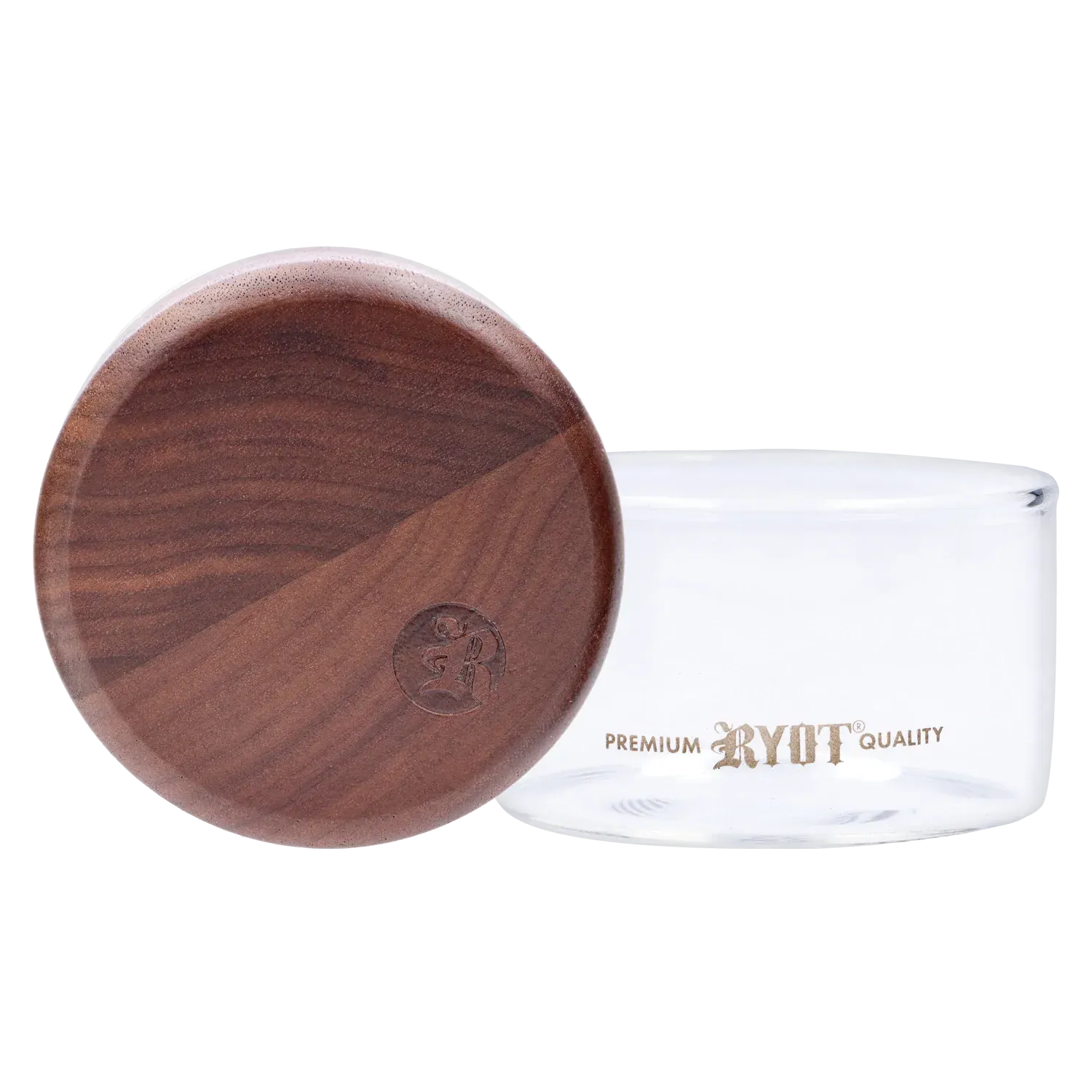 Close-up front view of the RYOT - GR8TR Walnut Wood Top Grinder w/ Clear Glass Jar Body - 3 inch showing the round walnut lid with branded stamp resting against the clear glass jar.