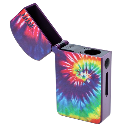 Angled close-up of the RYOT - Verb 510 Battery - Tye Dye with its lid open, showing a bright spiral tie-dye pattern and purple casing