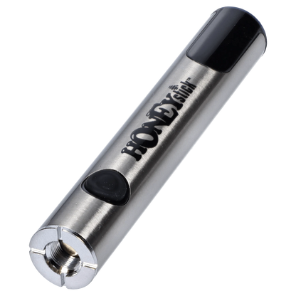 Angled close-up of the silver HoneyStick Digital Battery - Silver Carton showing its brushed metal body, black button, and rounded black tip.