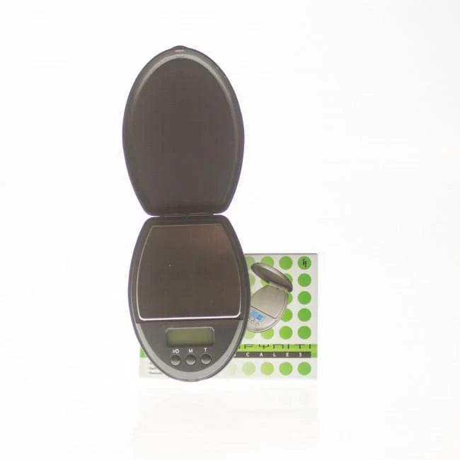 A close-up, angled view of the silver Infyniti Smart Scale - 100/0.01g, showing its digital display and compact, sleek design.