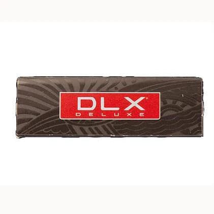 Front view of DLX Rolling Papers – 1 ¼, showcasing a stacked pack against a neutral background.