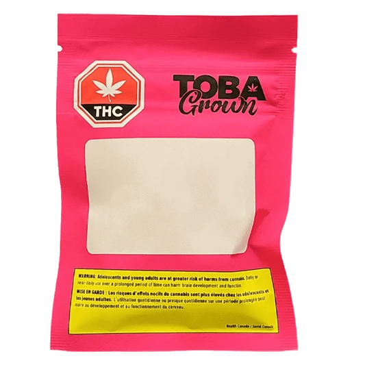 Front view of the Tobies Pre Rolled 5 x 0.5 g packaging with a cannabis leaf and bold branding against a dark background.